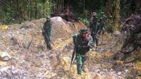 TNI-POLRI Buru Sisah Kelompok Bersenjata Kedalam Hutan Poso